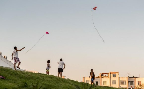 Local children flying kites