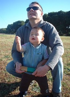 Child Flying Kite - Aren holding on to the Windjam Delta's line.