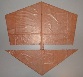 The 2-Skewer Roller - sail cut out and edged with sticky tape