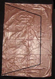 The Dowel Rokkaku - template shape marked on plastic bag.
