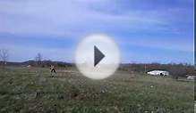 Human kite flying missing cow patties.
