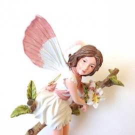 White fairy blossom fairy figurine